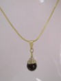 /products/gargantilha-lisa-e-pingente-marrom-com-strass-banhados-a-ouro/